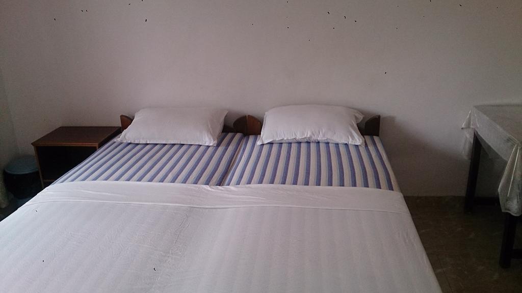Domingos Guest House Baga Pokoj fotografie